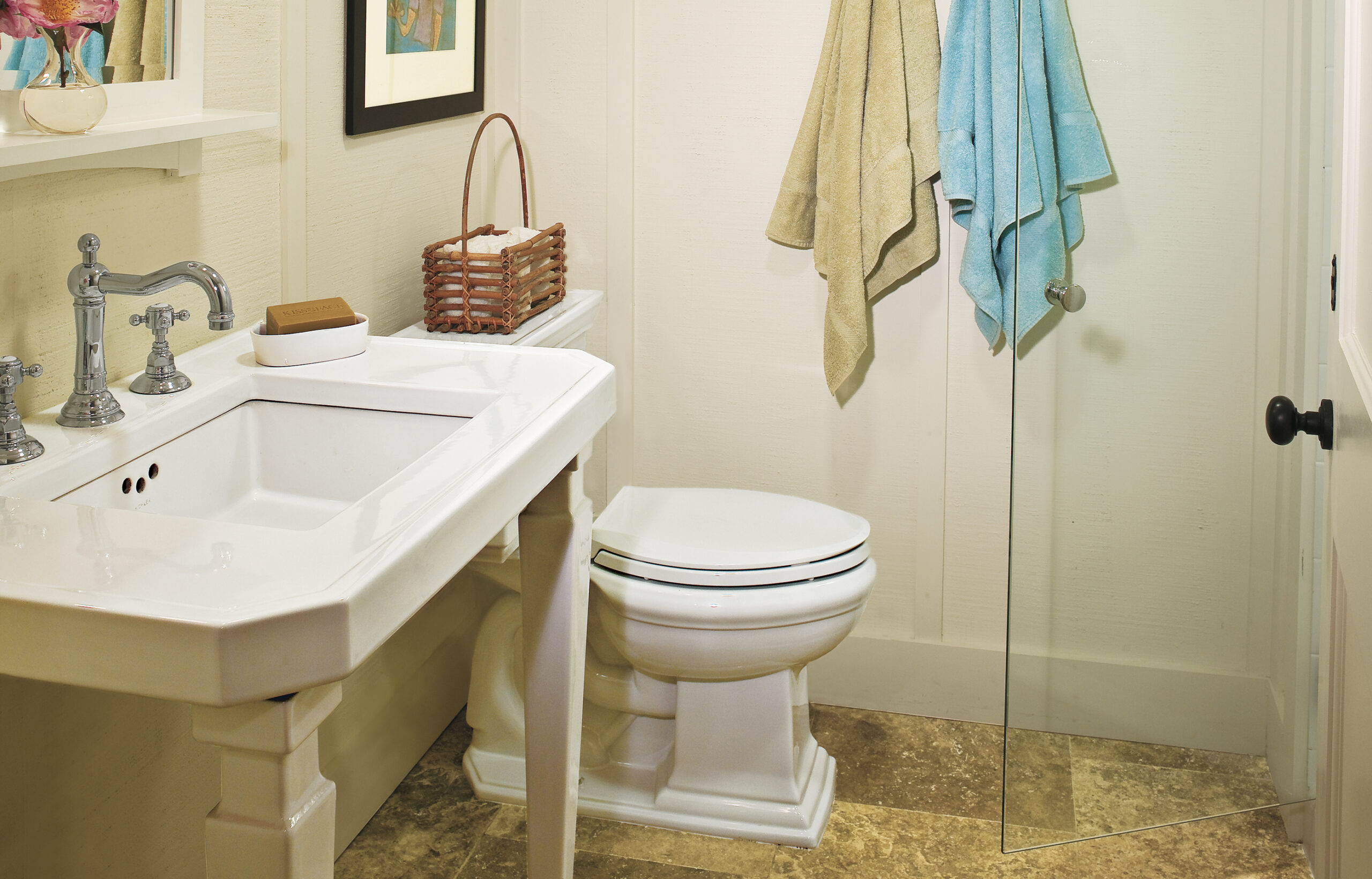 A vintage-style bathroom in the basement of a deck.