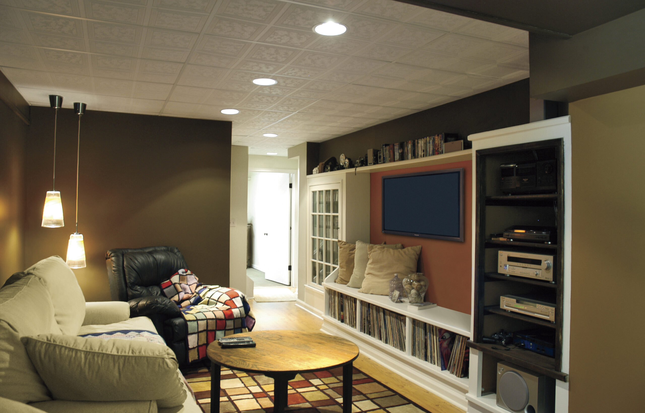 A home theater space in a house's basement.