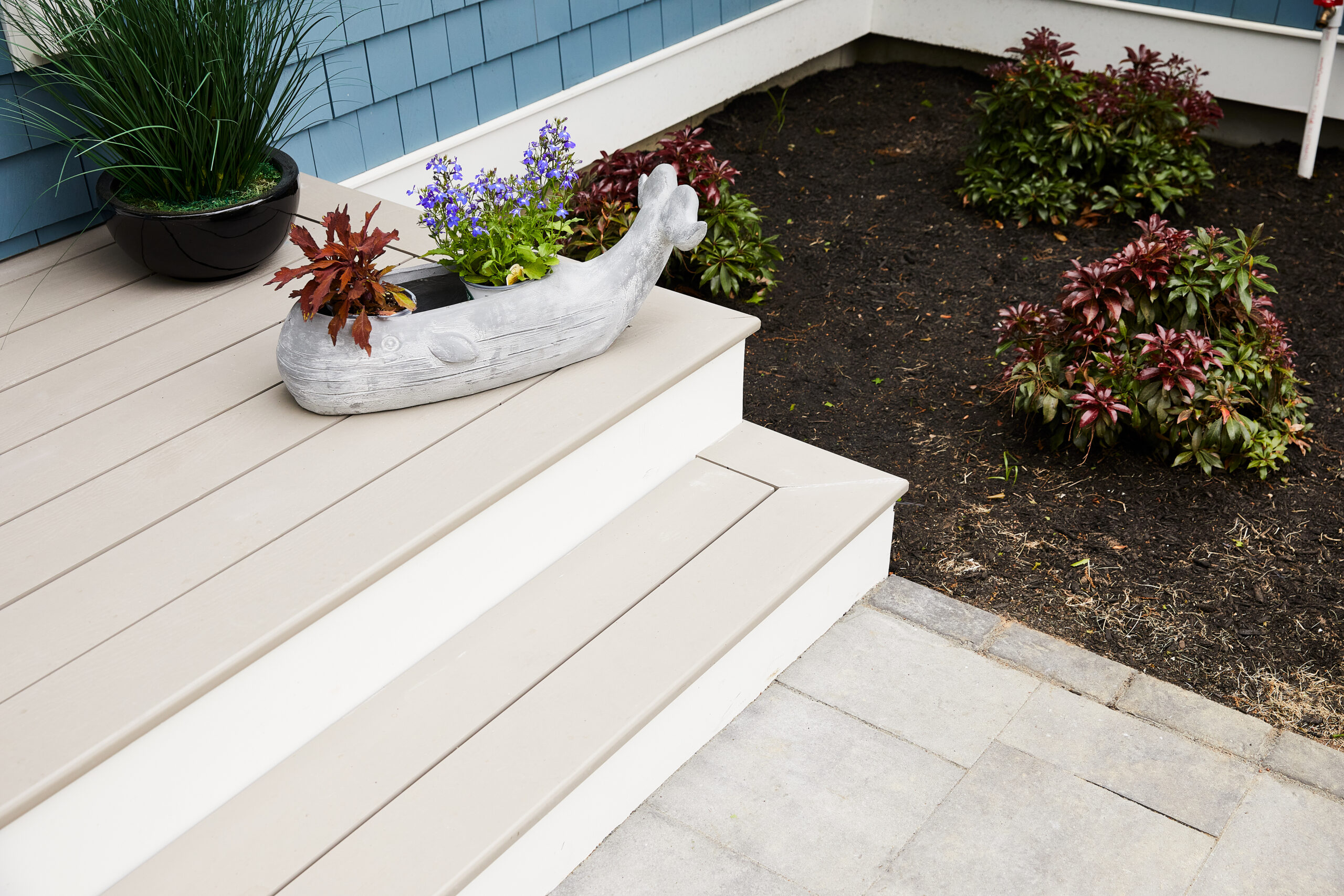 ADU entry steps with ADA slip-compliant Aeratis porch plank surface.